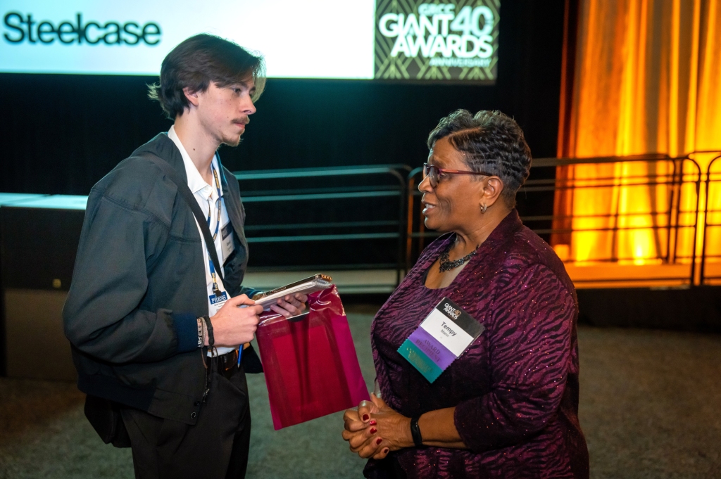 Reporter interview at GRCC GIANT 40 Awards Anniversary, February 25, 2023 at the Devon Place, Grand Rapids. 